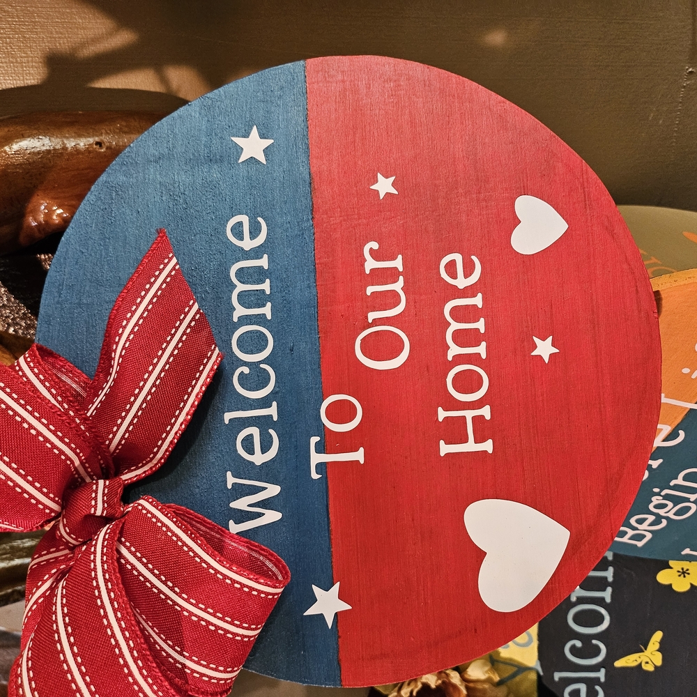 Red and Blue Welcome Sign